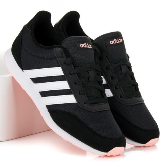 black adidas with pink soles